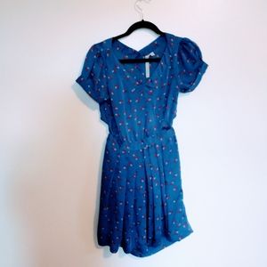 Reformed size small blue floral cutout dress with button up back.